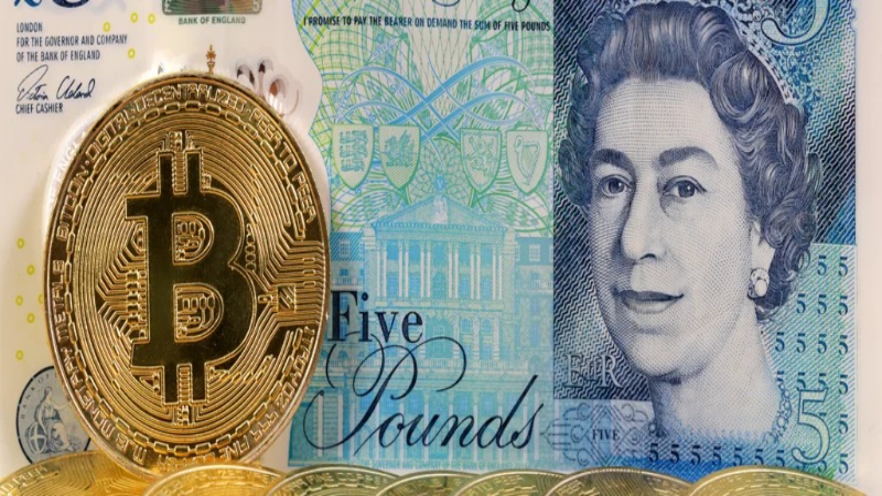 five-pound-bill-and-bitcoin-coin (1)